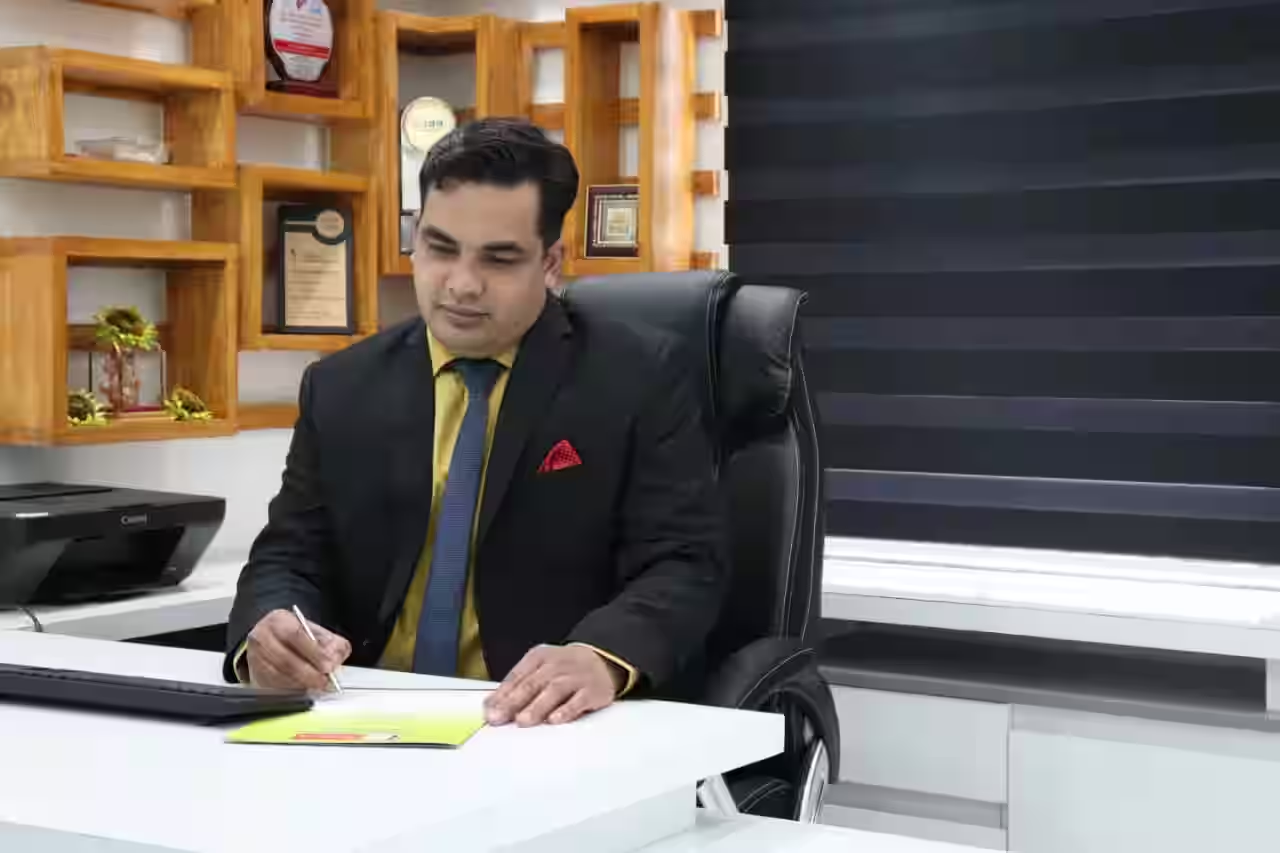 Dr. Vijaykumar Girhe at his consultation desk at the Center for Cranio-Maxillofacial, Reconstructive and Dental Implant Surgery in Chhatrapati Sambhajinagar