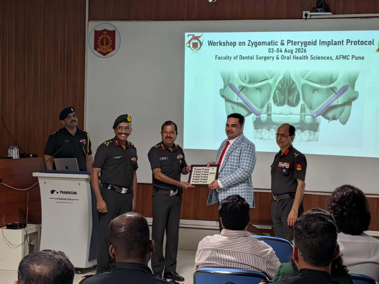 Dr. Vijaykumar Girhe being felicitated by senior Army Medical Corps officers at the Zygomatic and Pterygoid Implant Protocol workshop, AFMC Pune